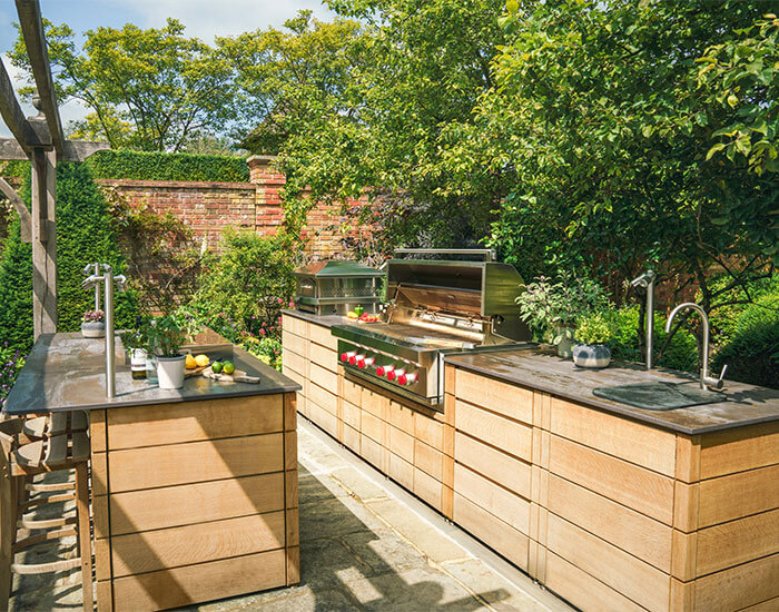 Large Gaze Burvill Outdoor Kitchen with an island
